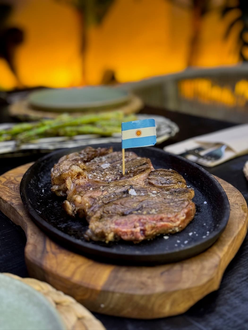 Grilled steak served on a wooden board